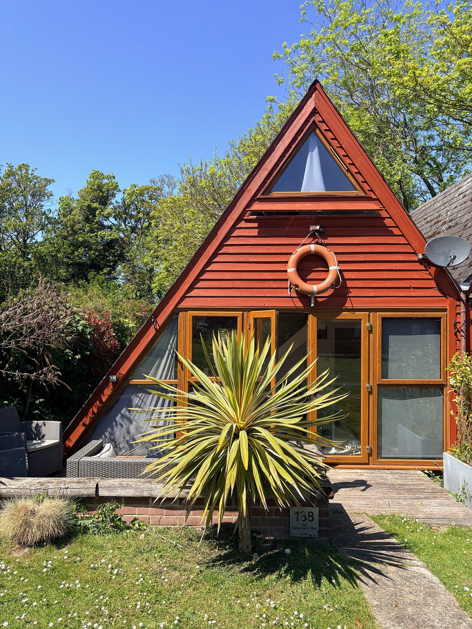 The cabin — A-frame front with lifebuoy